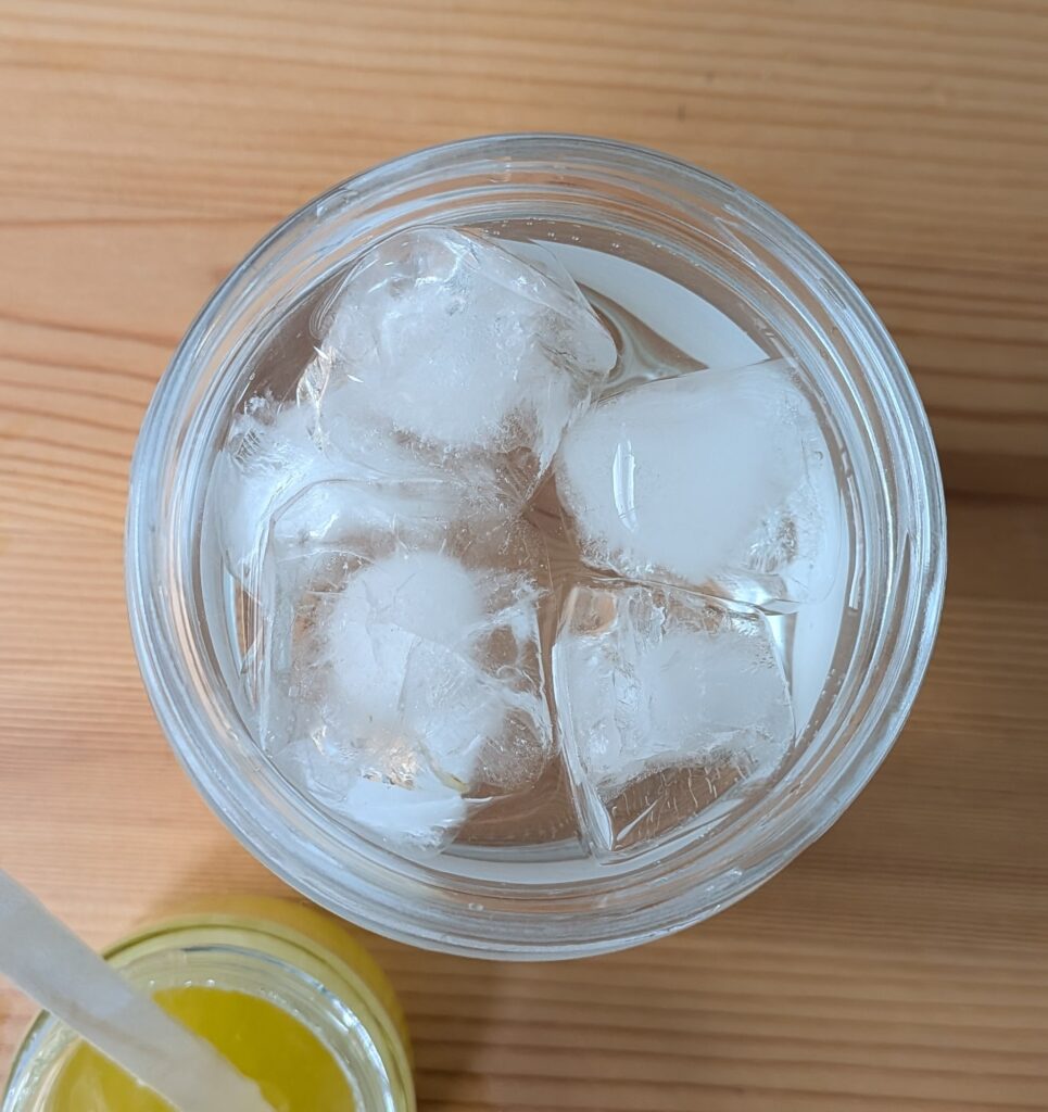 Top view of ice cubes in a jar.