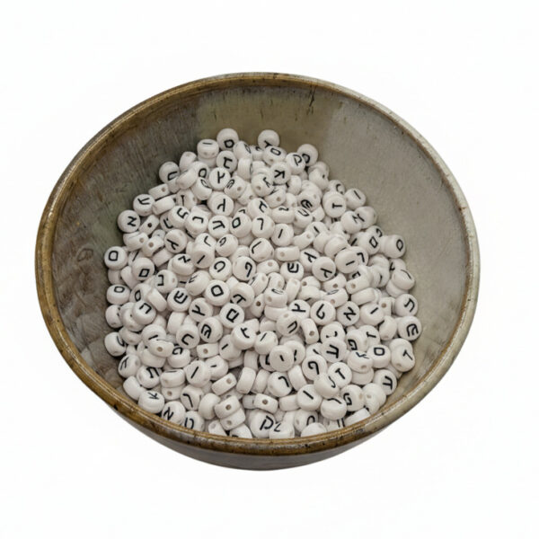 Bowl of plastic Hebrew beads.