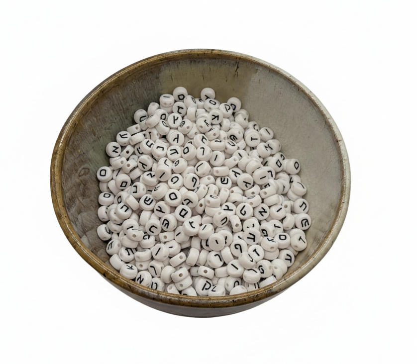 Bowl of plastic Hebrew beads.