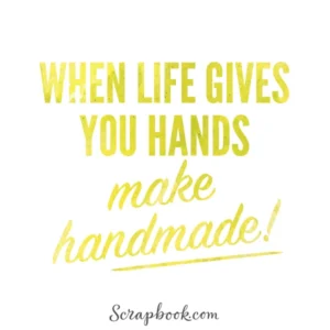 Yellow text on a white background, stating "When life gives you hands make handmade! scrapbook.com"