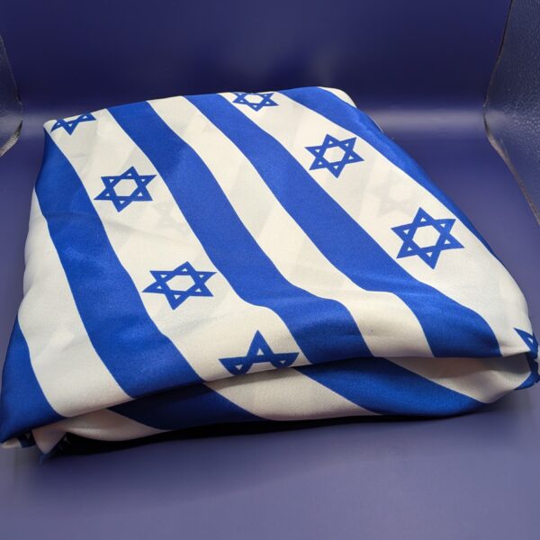 Striped Israeli flag fabric, neatly folded into a rectangle.