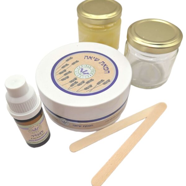 Kit of lavender essential oil, shia butter, two glass jars, and two popsicle sticks.