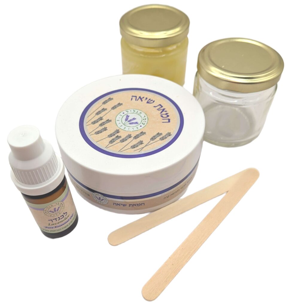 Kit of lavender essential oil, shia butter, two glass jars, and two popsicle sticks.